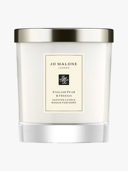 Jo Malone English Pear & Freesia Scented Home Candle in branded tub component on a light gray background