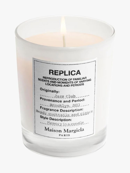 Maison Margiela Replica Jazz Club Scented Candle in branded component on a light gray background