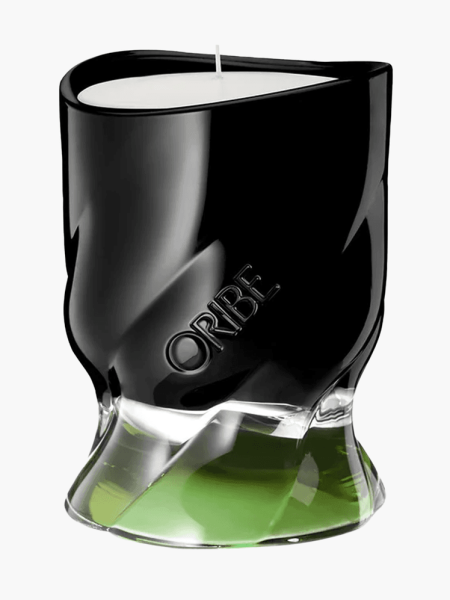 Desertland Candle in black and green gradient jar on light gray background