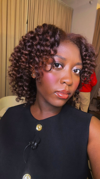 Beauty editor Annie Blay wearing wand curls on blown out natural hair