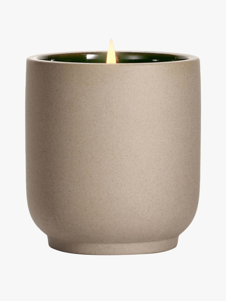 Homecourt Cece Candle in branded component on a light gray background