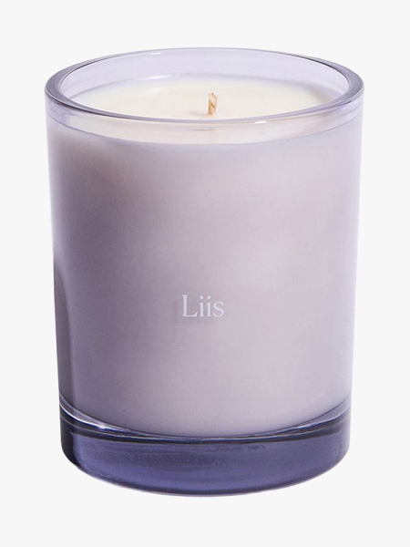 Liis Choux Choux Candle in branded component on a light gray background