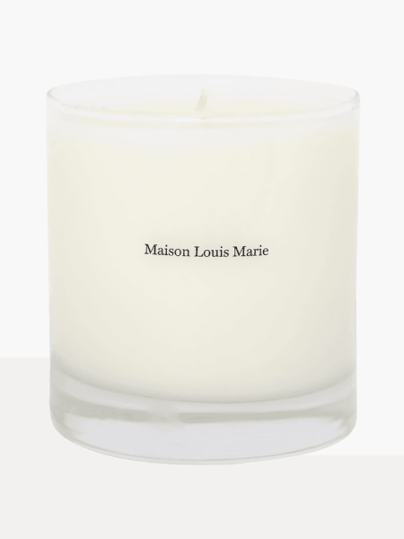 Le Refuge d’Ernest Candle in branded clear jar on light gray background